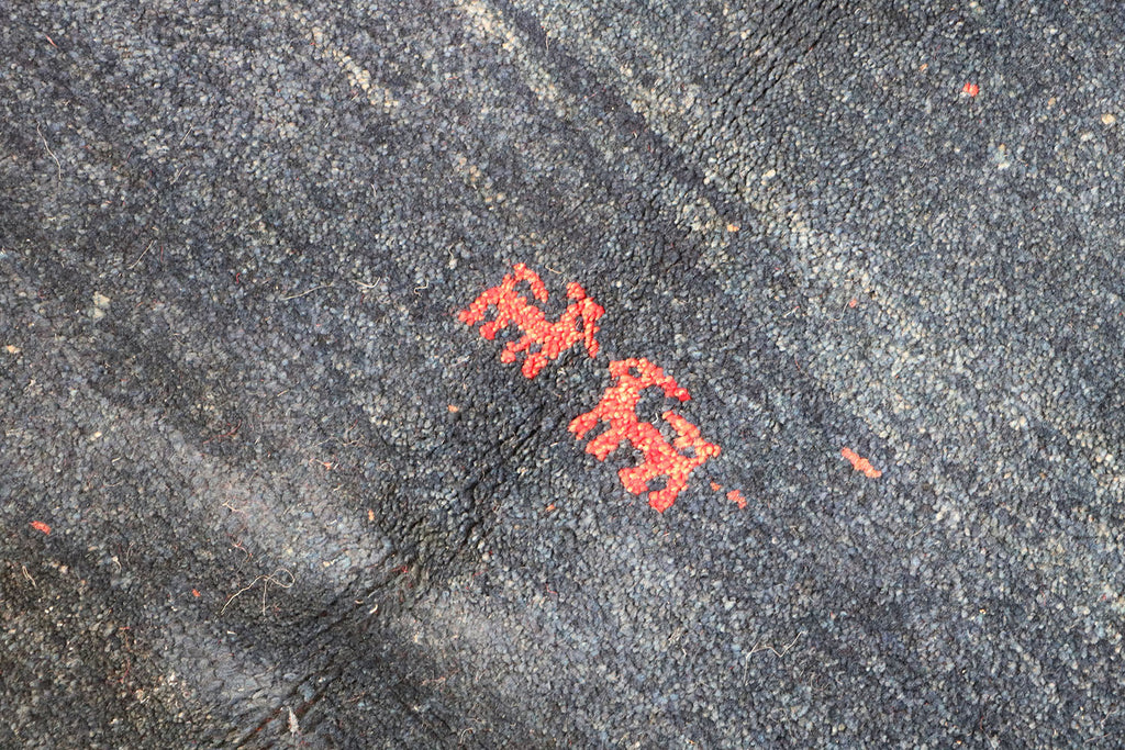 A traditional Gabeh Tribal Wool Rug