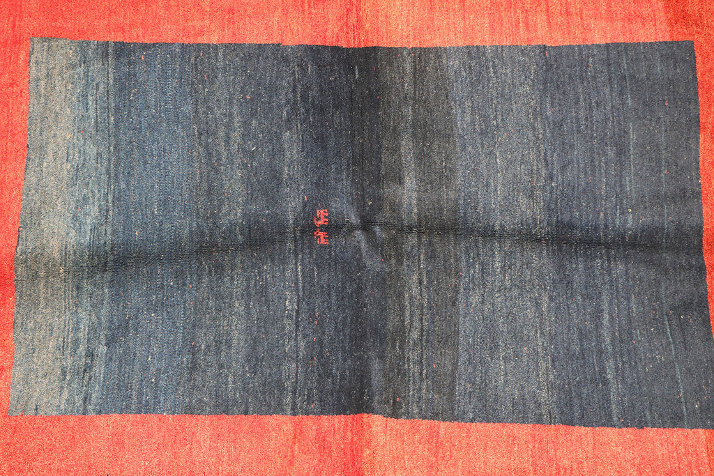 A traditional Gabeh Tribal Wool Rug