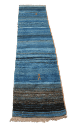A vertical image of a Gabbeh Runner Tribal Wool Rug