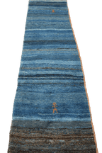 A vertical image of a Gabbeh Runner Tribal Wool Rug