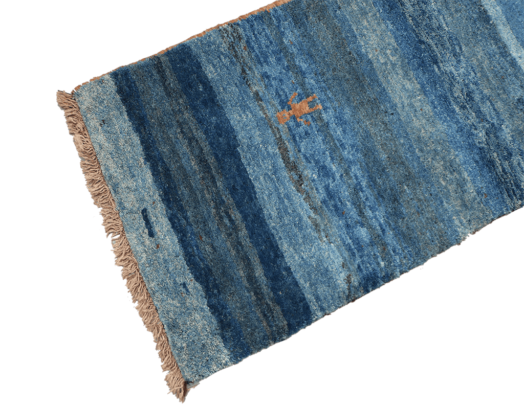 A vertical image of a Gabbeh Runner Tribal Wool Rug