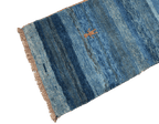 A vertical image of a Gabbeh Runner Tribal Wool Rug