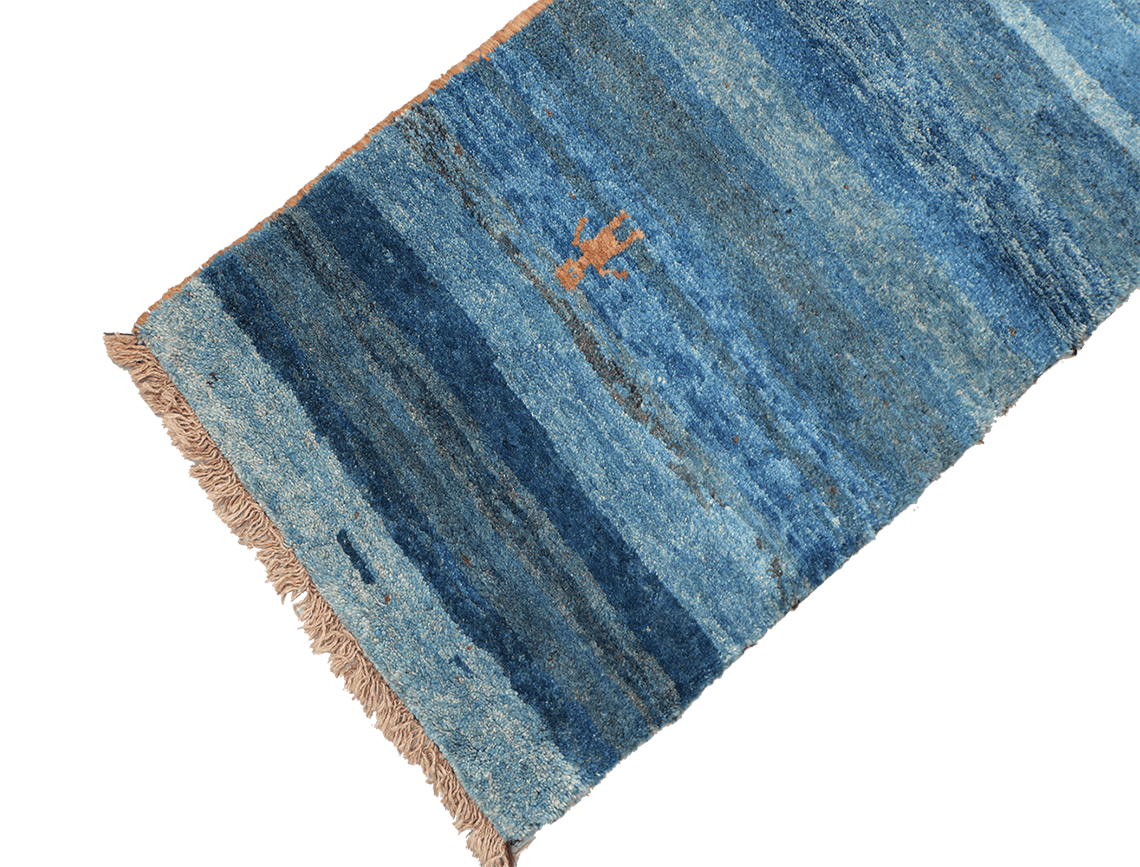 A vertical image of a Gabbeh Runner Tribal Wool Rug