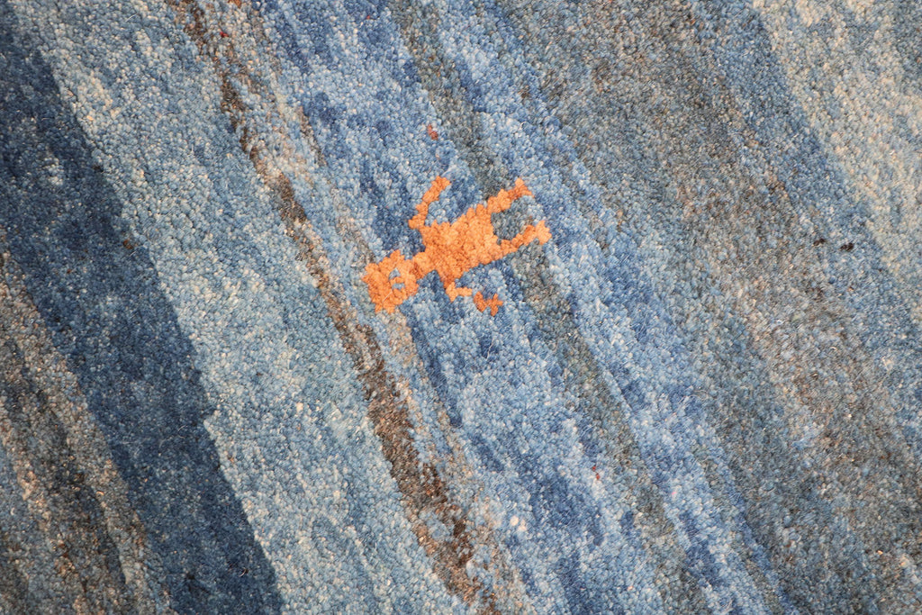 A vertical image of a Gabbeh Runner Tribal Wool Rug