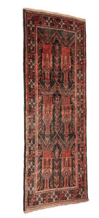 A Persian Baluch Tribal Wool Rug
