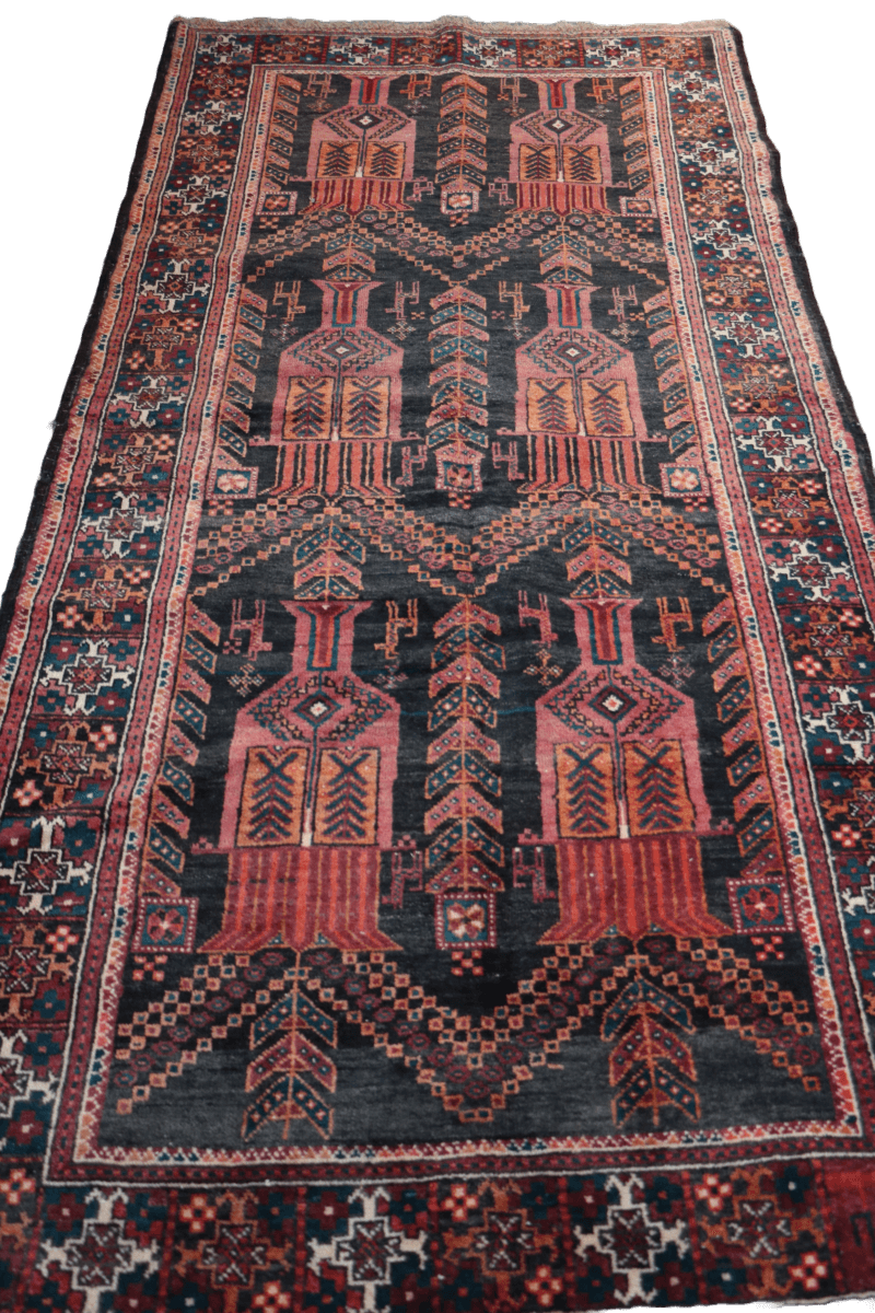 A Persian Baluch Tribal Wool Rug