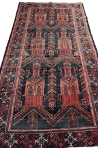 A Persian Baluch Tribal Wool Rug