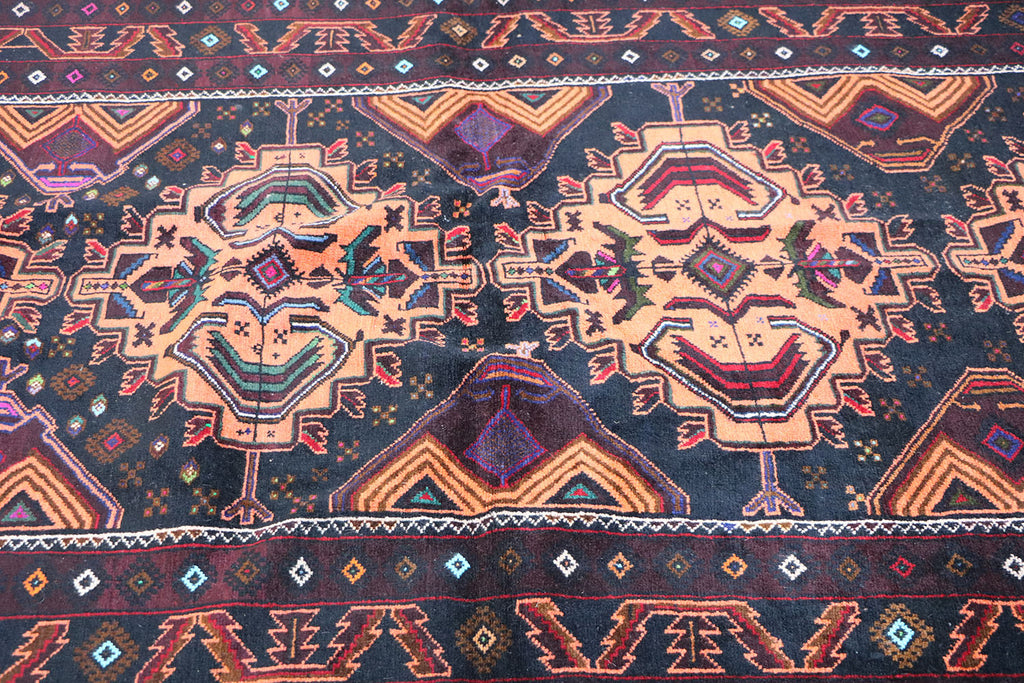 A Persian Baluch Tribal Wool Rug 