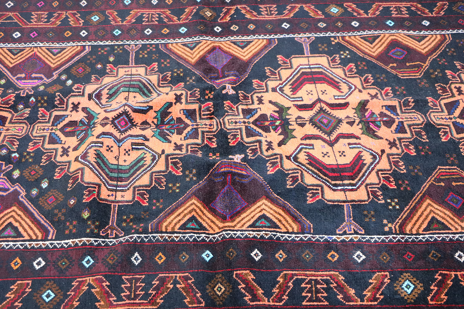 A Persian Baluch Tribal Wool Rug 