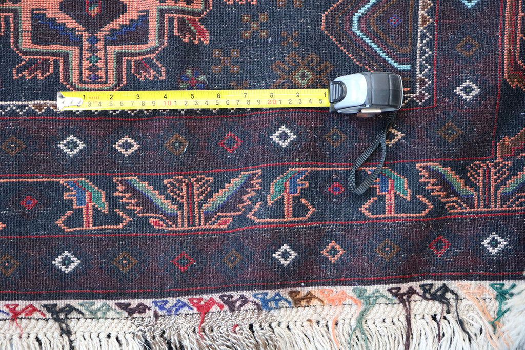 A Persian Baluch Tribal Wool Rug 