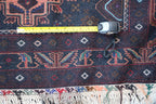 A Persian Baluch Tribal Wool Rug 