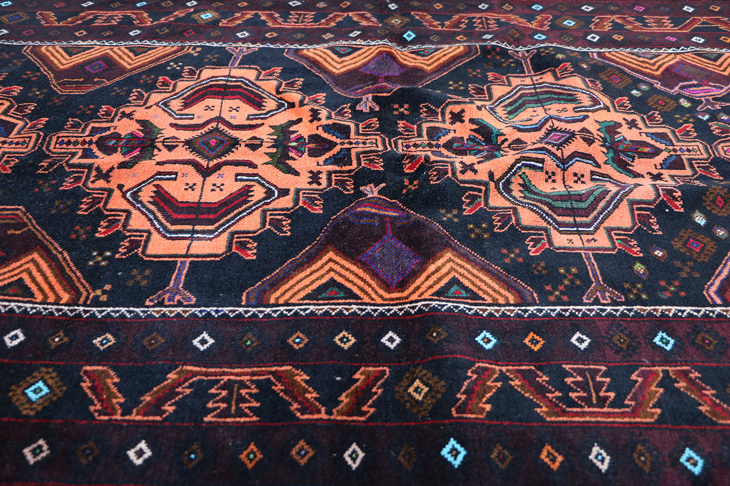 A Persian Baluch Tribal Wool Rug 