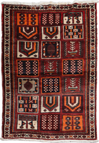A hand-knotted Persian Qashqai Tribal Wool Rug