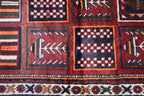 A hand-knotted Persian Qashqai Tribal Wool Rug