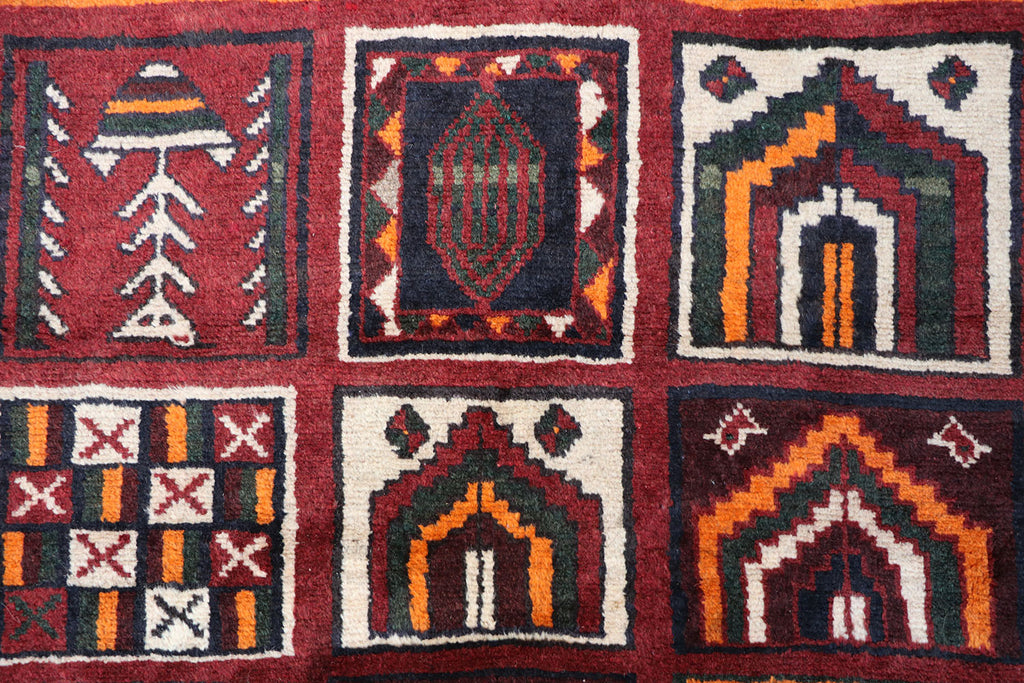 A hand-knotted Persian Qashqai Tribal Wool Rug