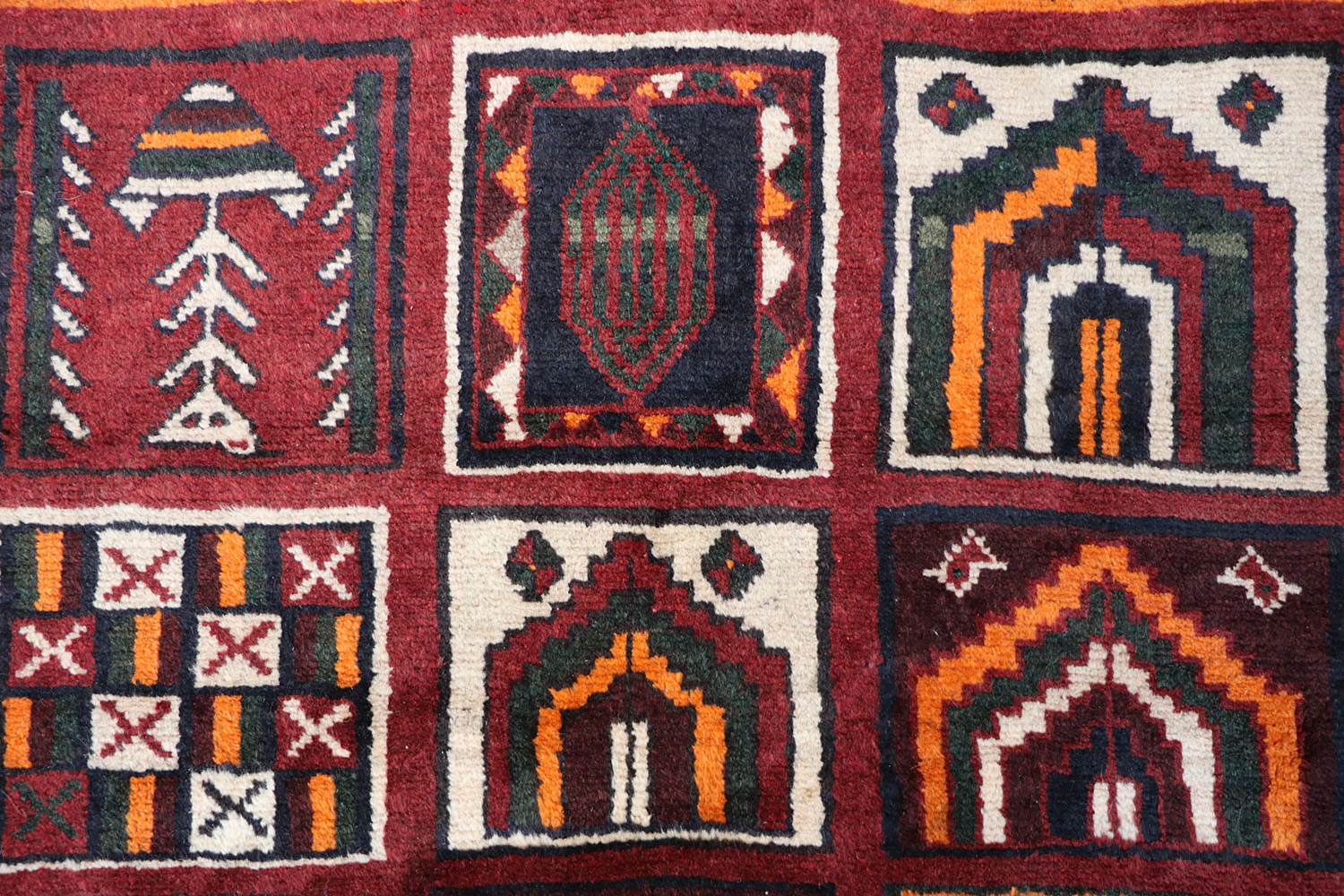 A hand-knotted Persian Qashqai Tribal Wool Rug