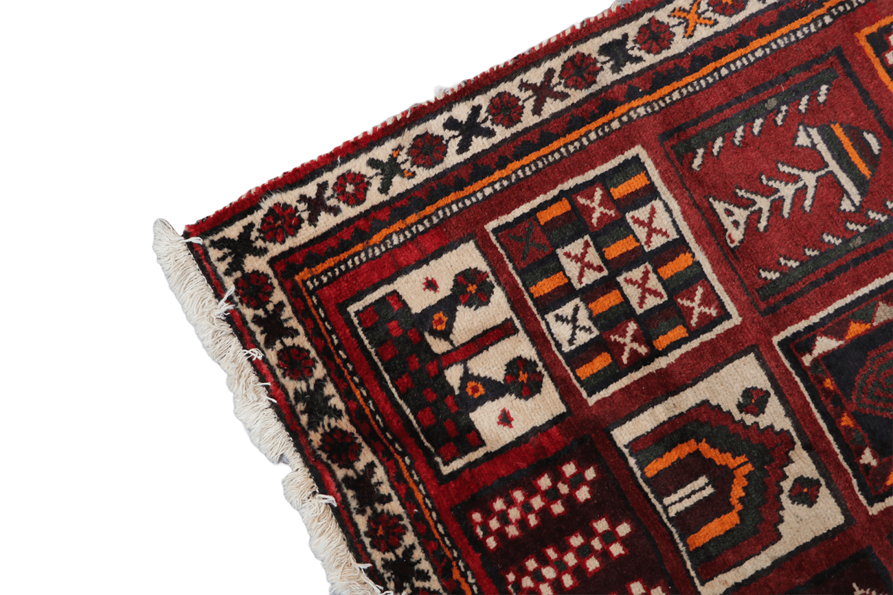 A hand-knotted Persian Qashqai Tribal Wool Rug