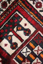 A hand-knotted Persian Qashqai Tribal Wool Rug