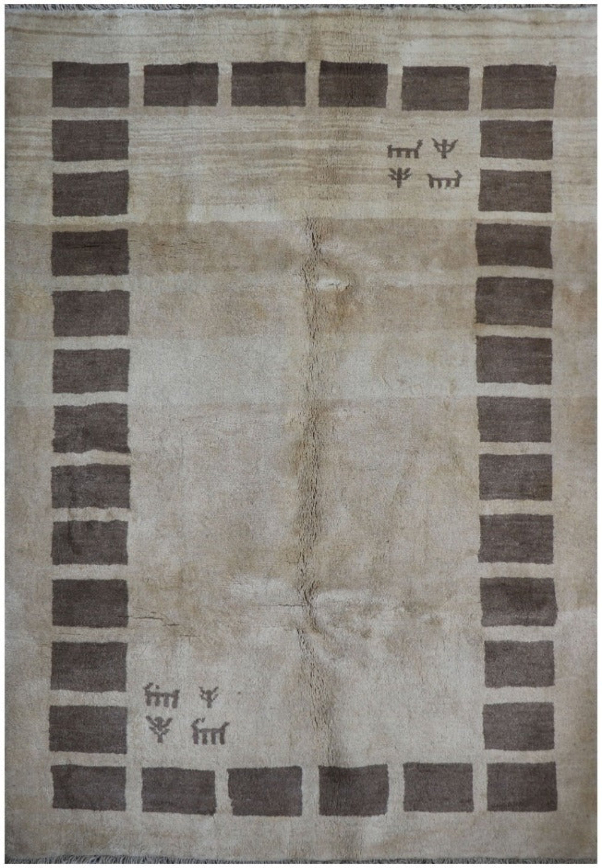 A rectangular Persian Gabbeh Tribal wool rug