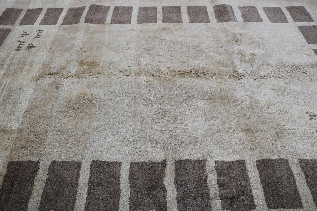 A rectangular Persian Gabbeh Tribal wool rug