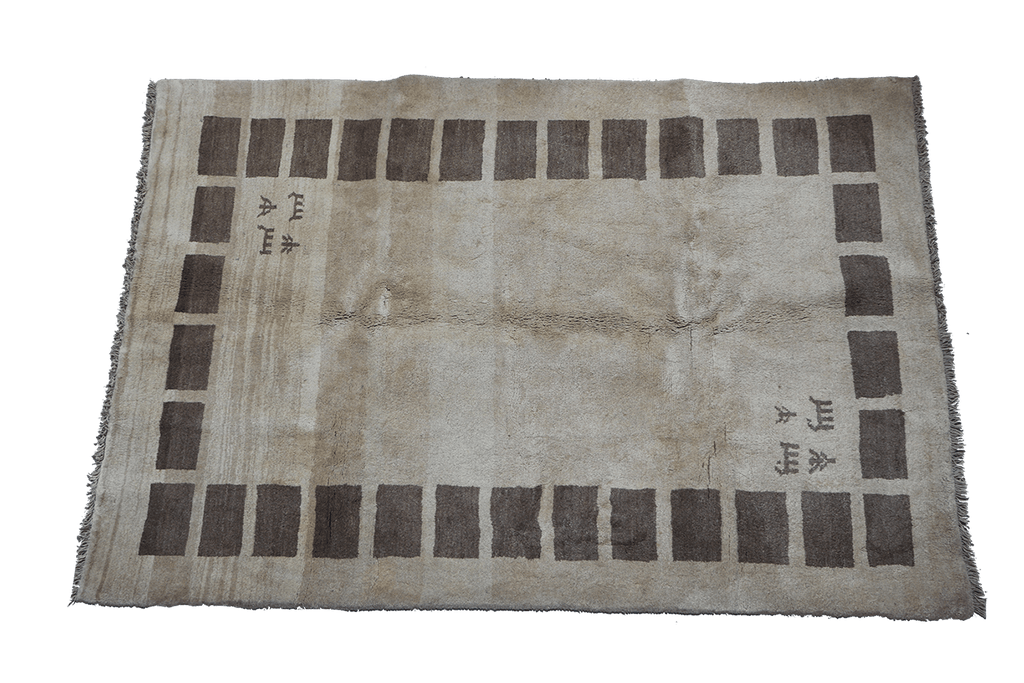 A rectangular Persian Gabbeh Tribal wool rug