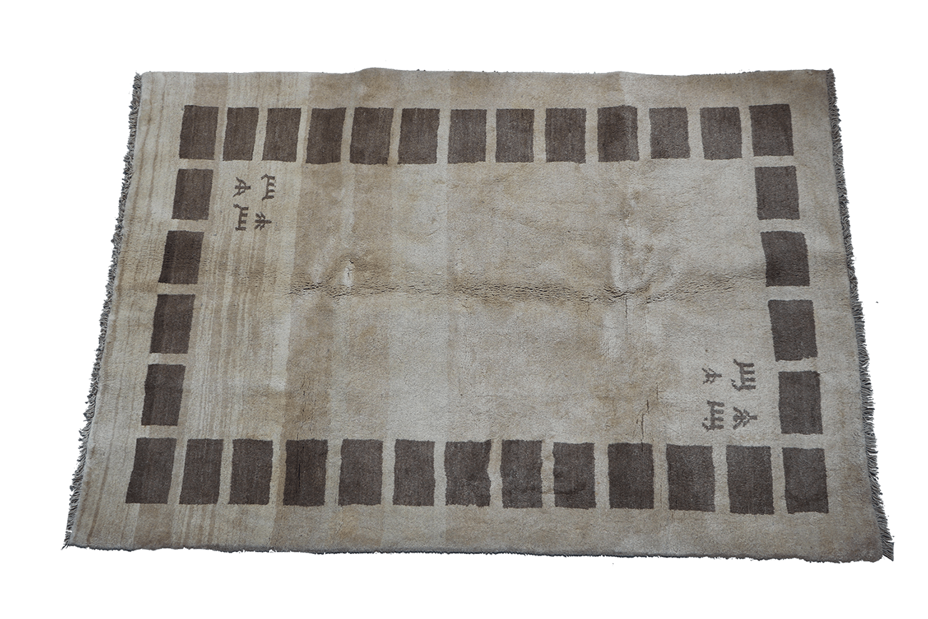 A rectangular Persian Gabbeh Tribal wool rug