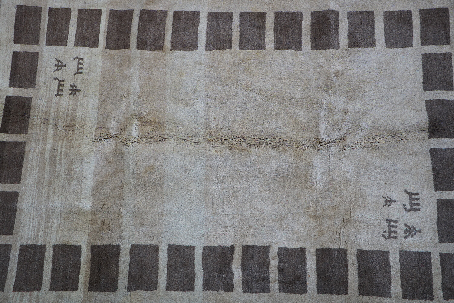 A rectangular Persian Gabbeh Tribal wool rug