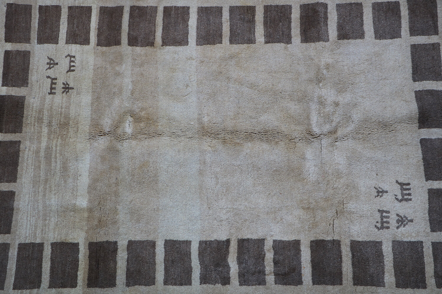 A rectangular Persian Gabbeh Tribal wool rug