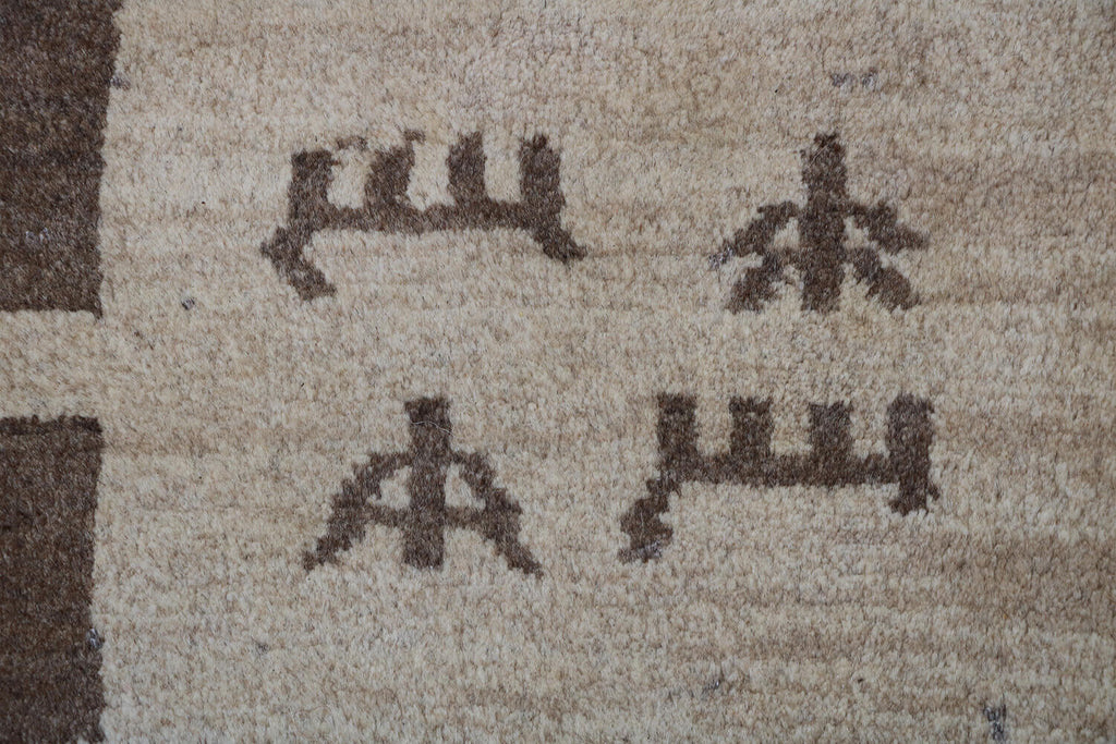 A rectangular Persian Gabbeh Tribal wool rug