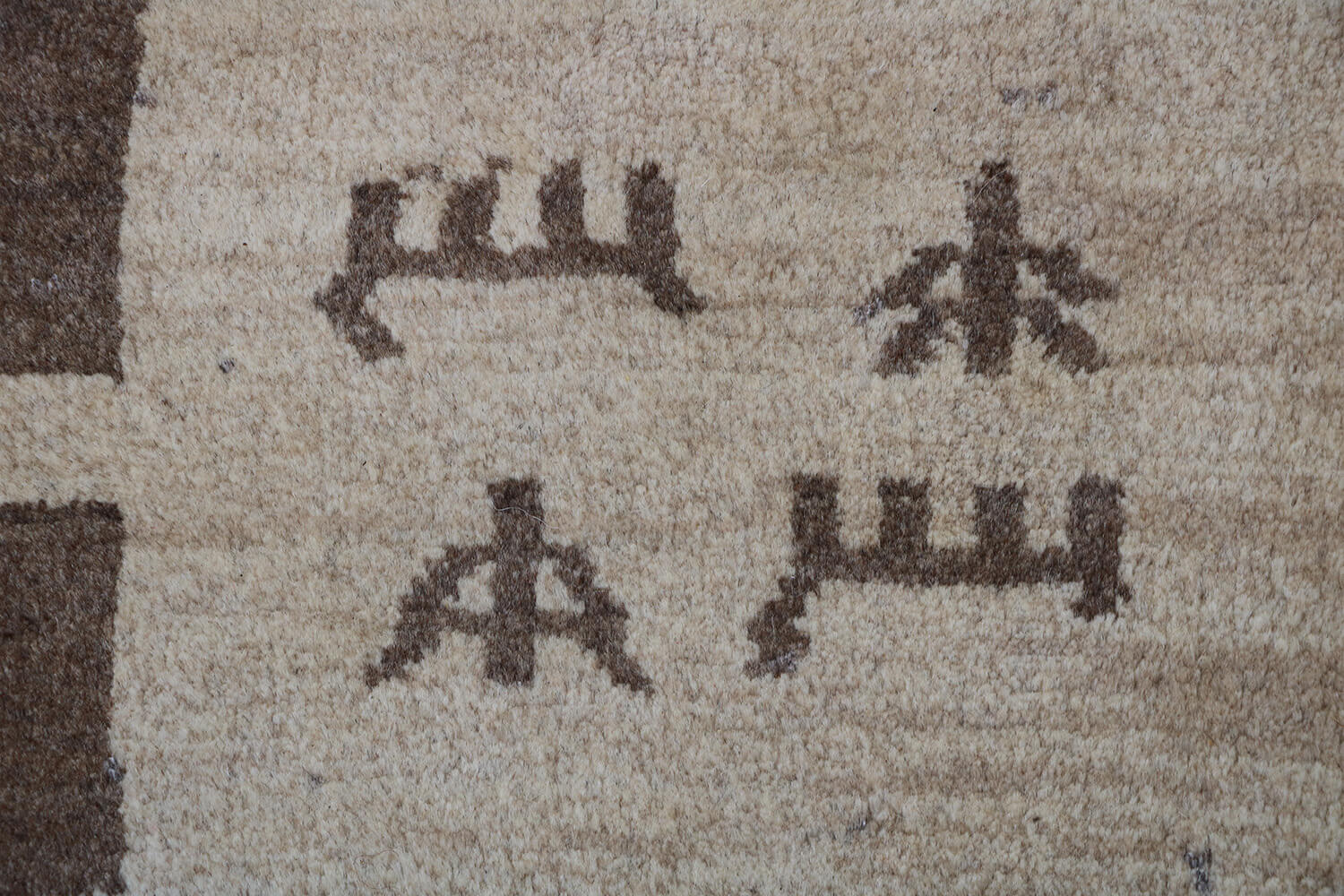 A rectangular Persian Gabbeh Tribal wool rug