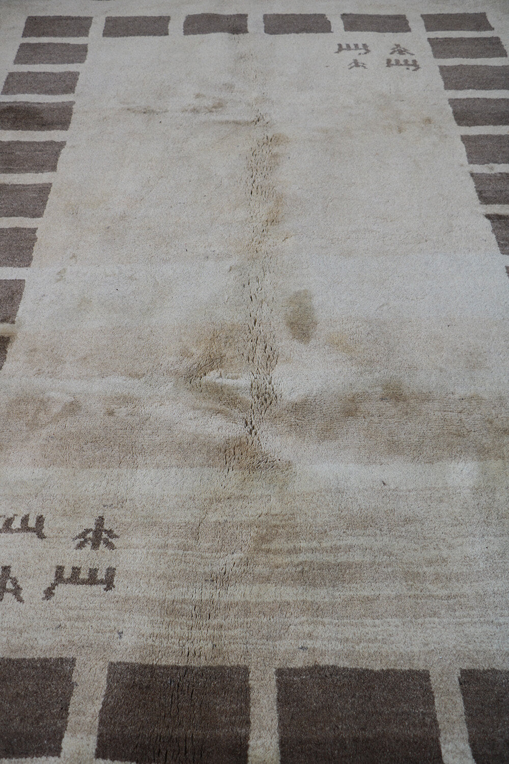 A rectangular Persian Gabbeh Tribal wool rug
