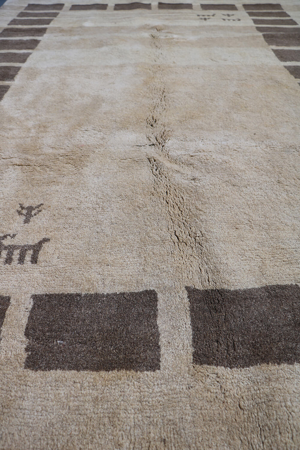 A rectangular Persian Gabbeh Tribal wool rug