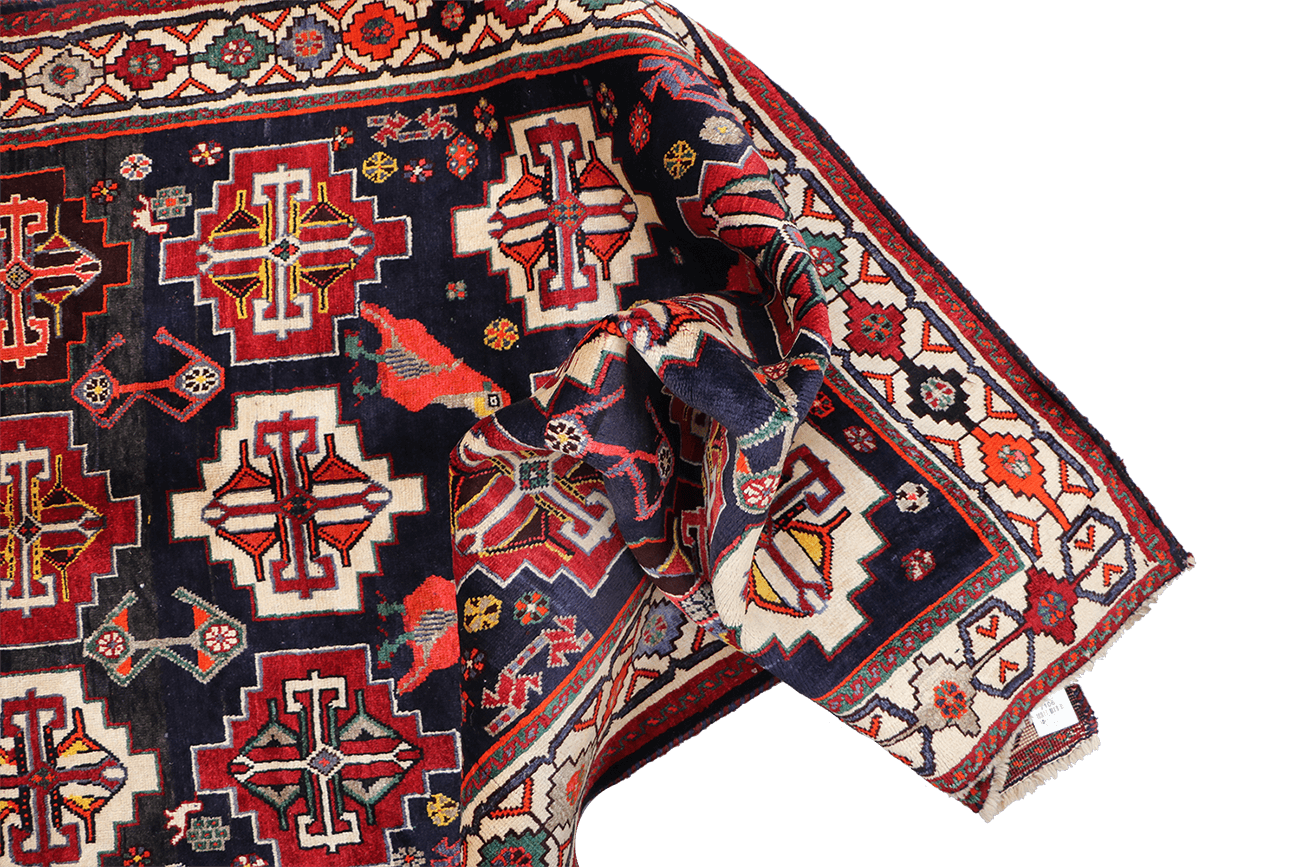 A hand-knotted Tribal Qashqai Wool Rug