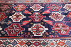 A hand-knotted Tribal Qashqai Wool Rug