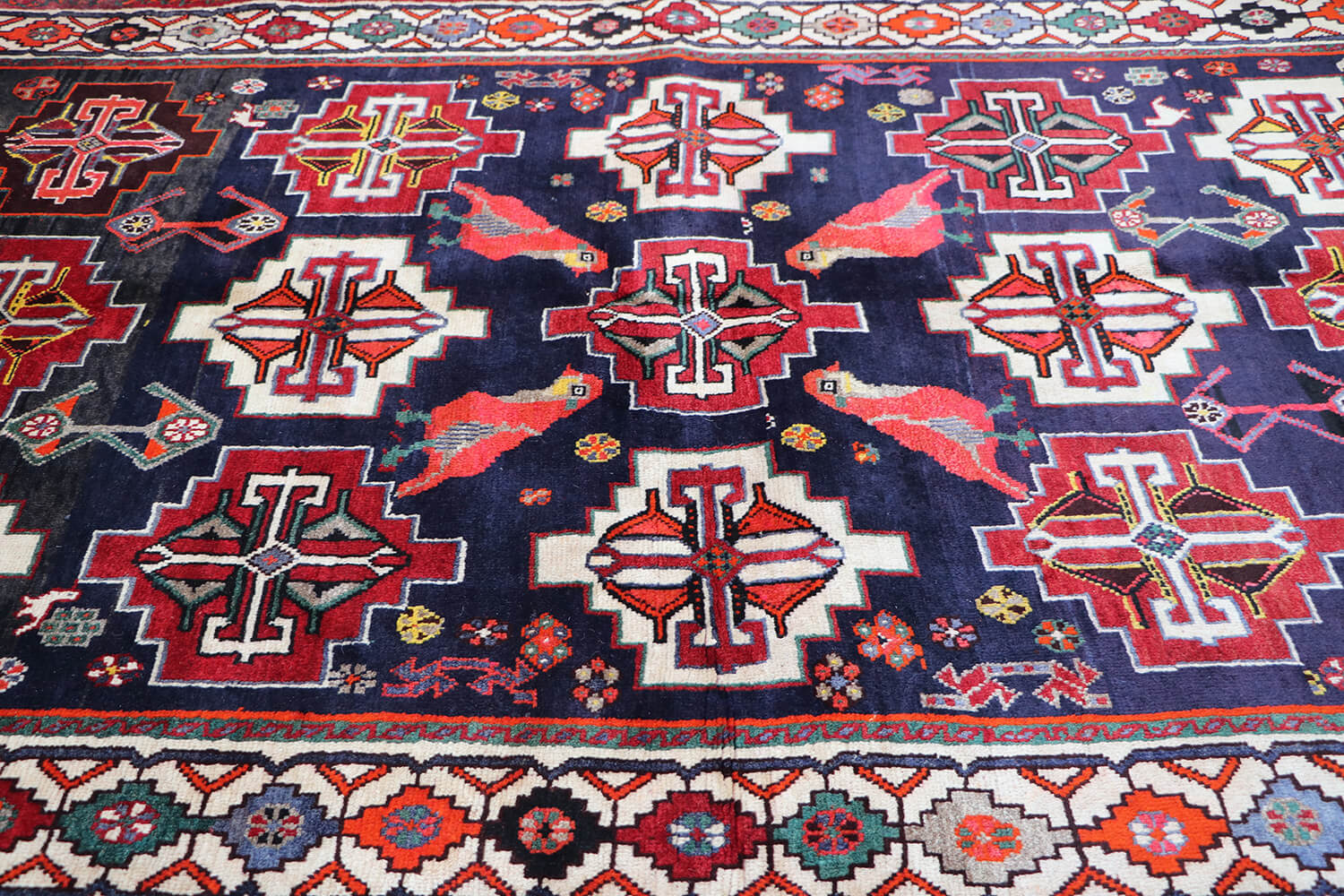 A hand-knotted Tribal Qashqai Wool Rug