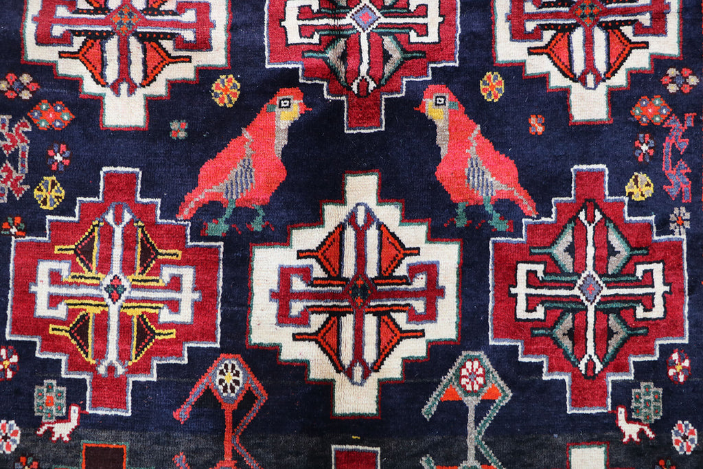 A hand-knotted Tribal Qashqai Wool Rug