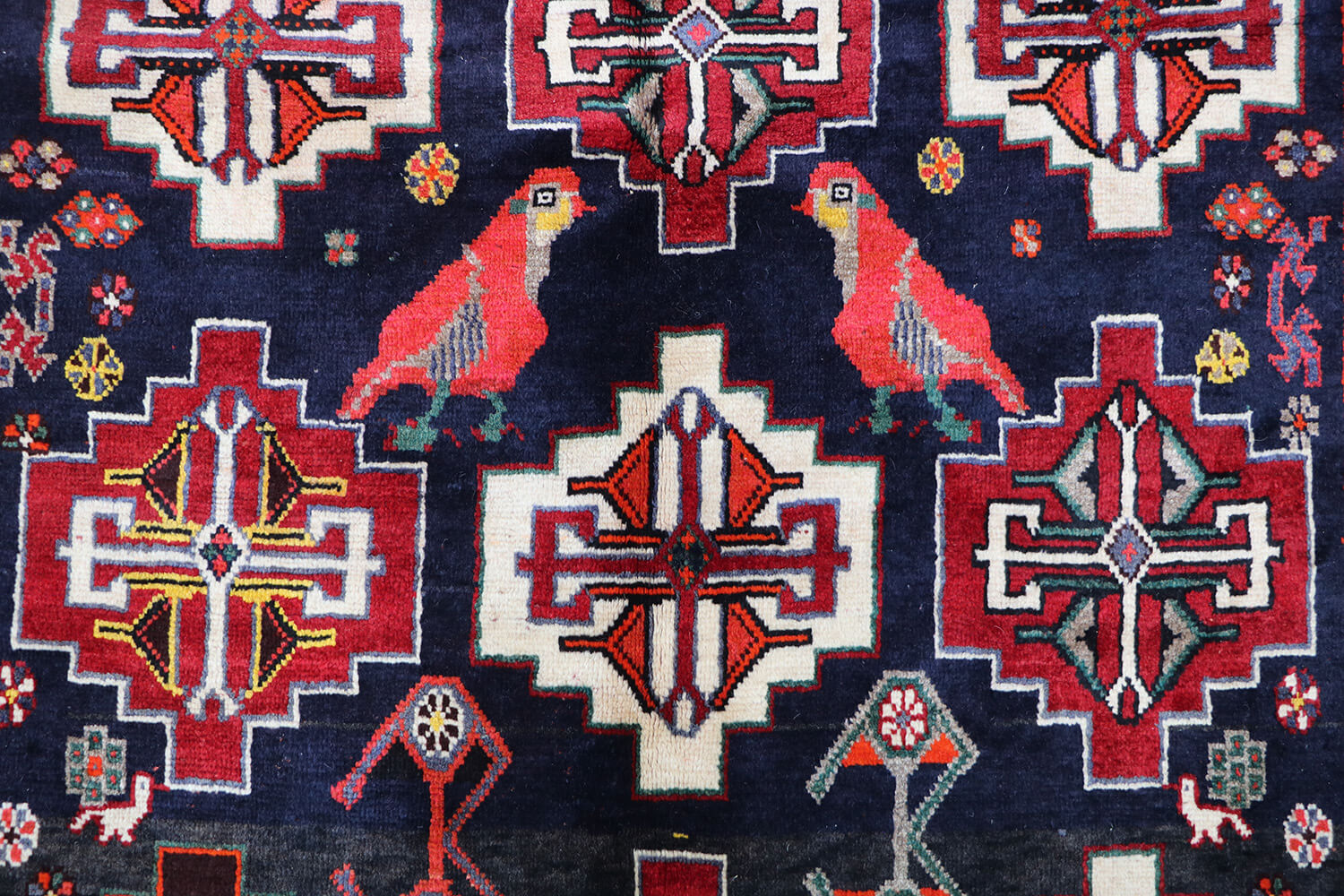 A hand-knotted Tribal Qashqai Wool Rug
